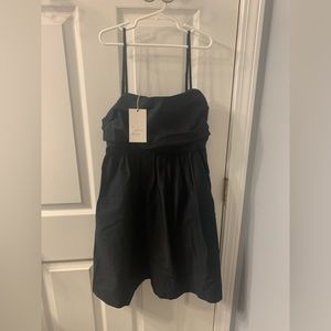 XS Black ruffled dress with pockets